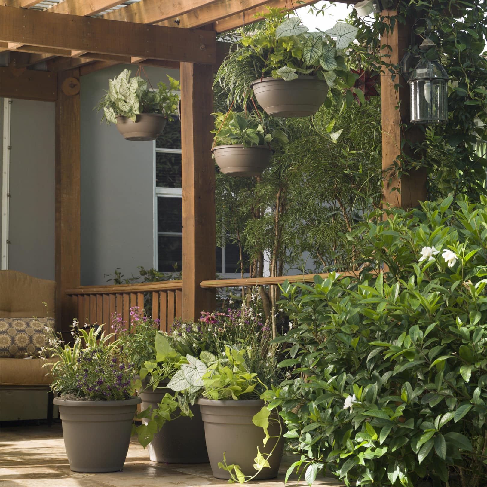 outdoor deck with emma planters and hanging bowls